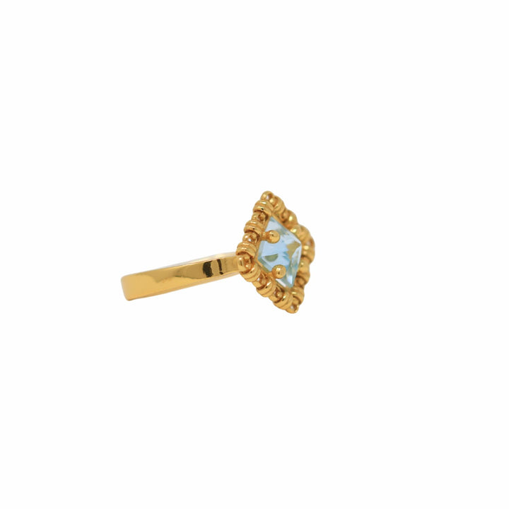 Quadra Ring in Gold with Blue Topaz