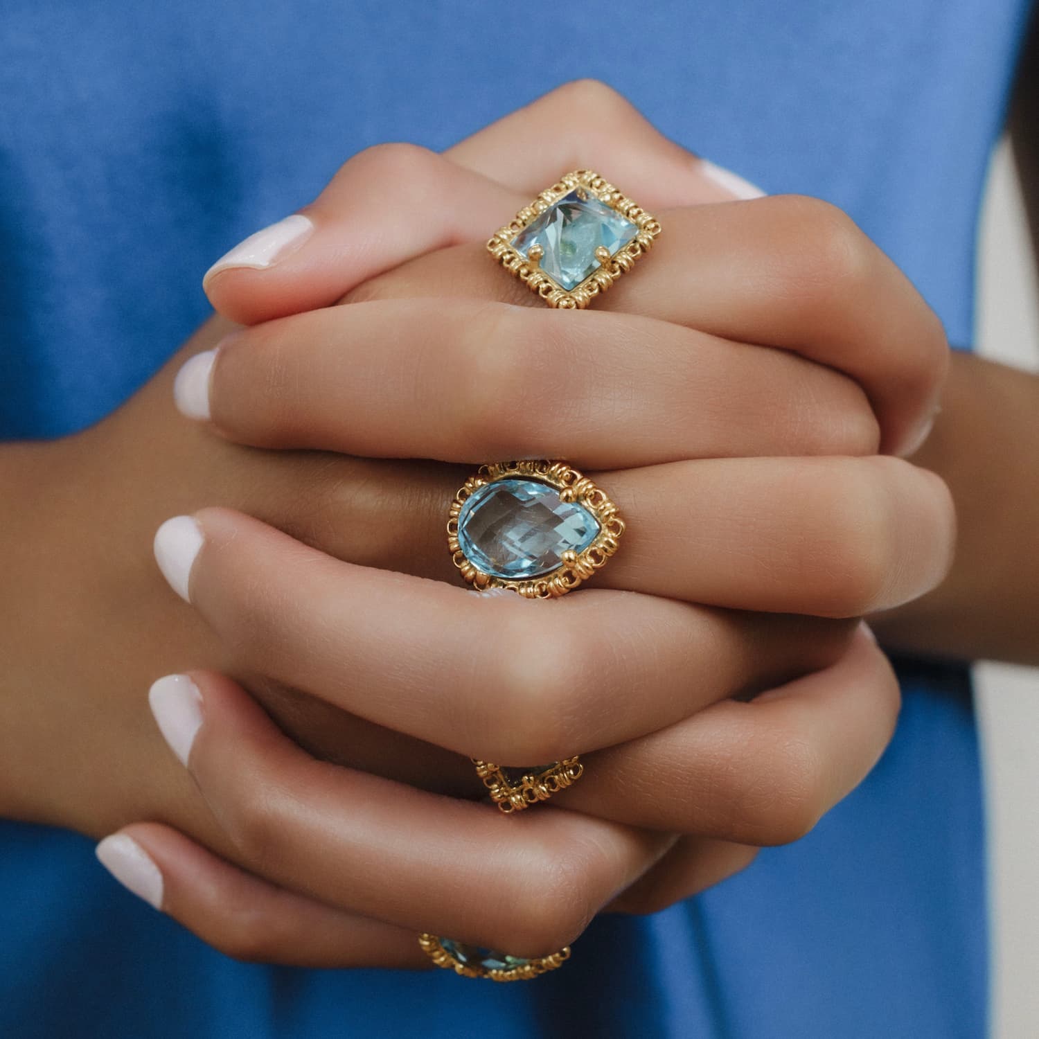 Quadra Ring in Gold with Blue Topaz