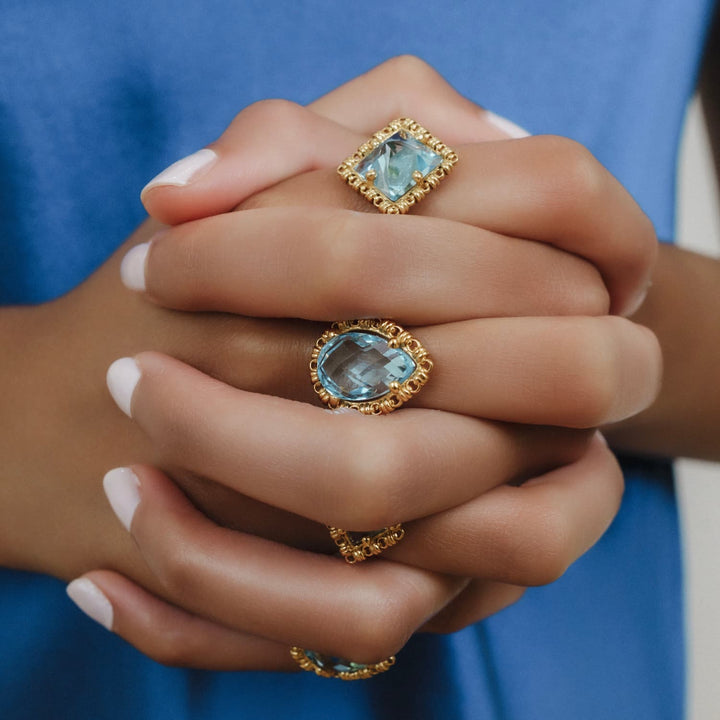 Quadra Ring in Gold with Blue Topaz