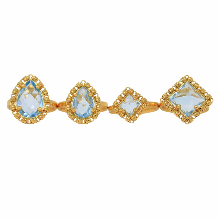Quadra Ring in Gold with Blue Topaz