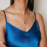 Quadra Pendant in Gold with Blue Topaz