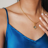 Quadra Pendant in Gold with Blue Topaz