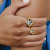 Quadra Ring in Gold with Blue Topaz