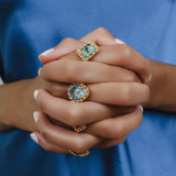 Quadra Ring in Gold with Blue Topaz